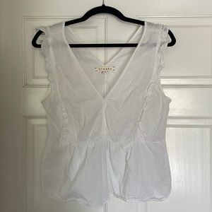 Xirena Penelope tank with ruffles.